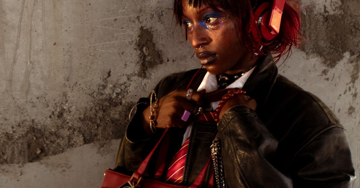 A moody, stylish image in warm light representing fetish and kink content creators